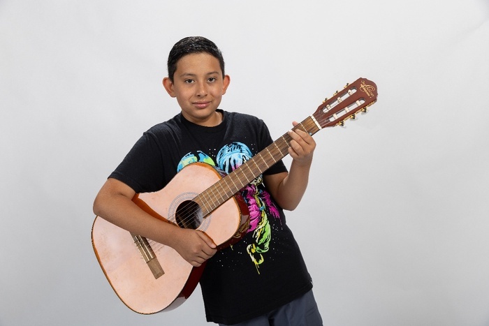 child enjoying music